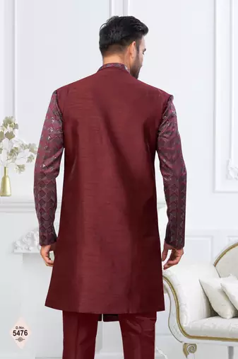 Dark maroon jacket-style indo-western set with thread and stone work, perfect for weddings and festive occasions.