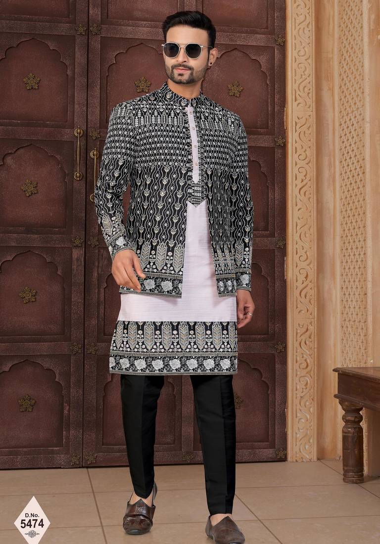 Black jacket-style indo-western set with thread and stone work, perfect for weddings and festive occasions.