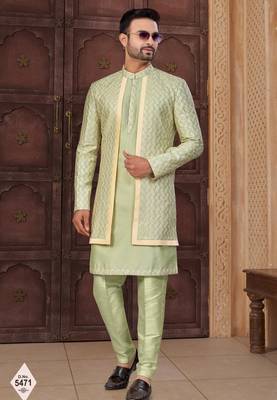 Pista green jacket-style indo-western set with thread and stone work, perfect for weddings and festive occasions. 1