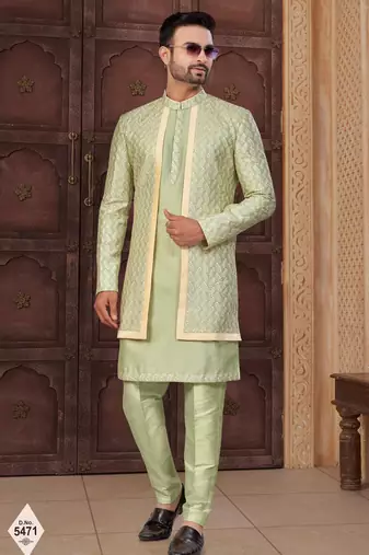Pista green jacket-style indo-western set with thread and stone work, perfect for weddings and festive occasions.