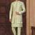 Pista green jacket-style indo-western set with thread and stone work, perfect for weddings and festive occasions.