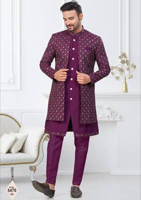 Purple jacket-style indo-western set with thread and stone work, perfect for weddings and festive occasions. 1