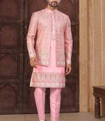 Pink jacket-style indo-western set with thread and stone work, perfect for weddings and festive occasions.