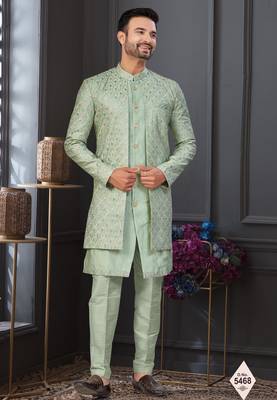 Pista green jacket-style indo-western set with thread and stone work, perfect for weddings and festive occasions. 1