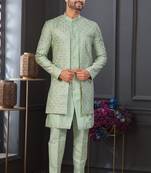 Pista green jacket-style indo-western set with thread and stone work, perfect for weddings and festive occasions.