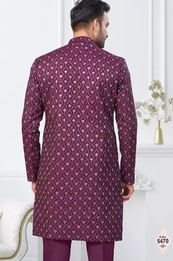 Purple jacket-style indo-western set with thread and stone work, perfect for weddings and festive occasions.