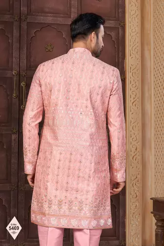 Pink jacket-style indo-western set with thread and stone work, perfect for weddings and festive occasions.