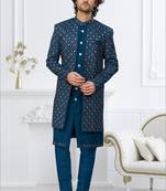 Blue jacket-style indo-western set with thread and stone work, perfect for weddings and festive occasions.