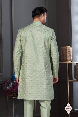 Pista green jacket-style indo-western set with thread and stone work, perfect for weddings and festive occasions. 3
