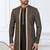 Black jacket-style indo-western set with thread and stone work, perfect for weddings and festive occasions.