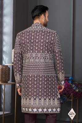 Dark maroon jacket-style indo-western set with thread and stone work, perfect for weddings and festive occasions. 3