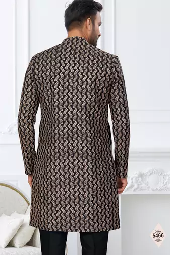 Black jacket-style indo-western set with thread and stone work, perfect for weddings and festive occasions.