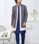 Blue jacket-style indo-western set with thread and stone work, perfect for weddings and festive occasions.