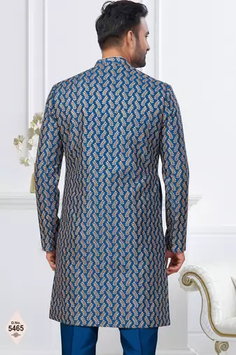 Blue jacket-style indo-western set with thread and stone work, perfect for weddings and festive occasions.