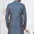 Blue jacket-style indo-western set with thread and stone work, perfect for weddings and festive occasions.