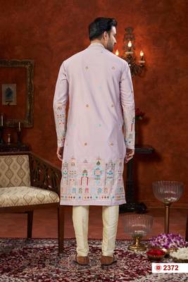 Purple colour soft silk kurta pajama set with floral buti and hem embroidery—perfect for festive wear. 3