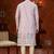 Purple colour soft silk kurta pajama set with floral buti and hem embroidery—perfect for festive wear.