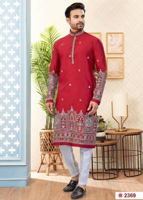 Maroon soft silk kurta pajama set with floral buti and hem embroidery—perfect for festive wear. 1
