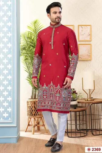 Maroon soft silk kurta pajama set with floral buti and hem embroidery—perfect for festive wear.
