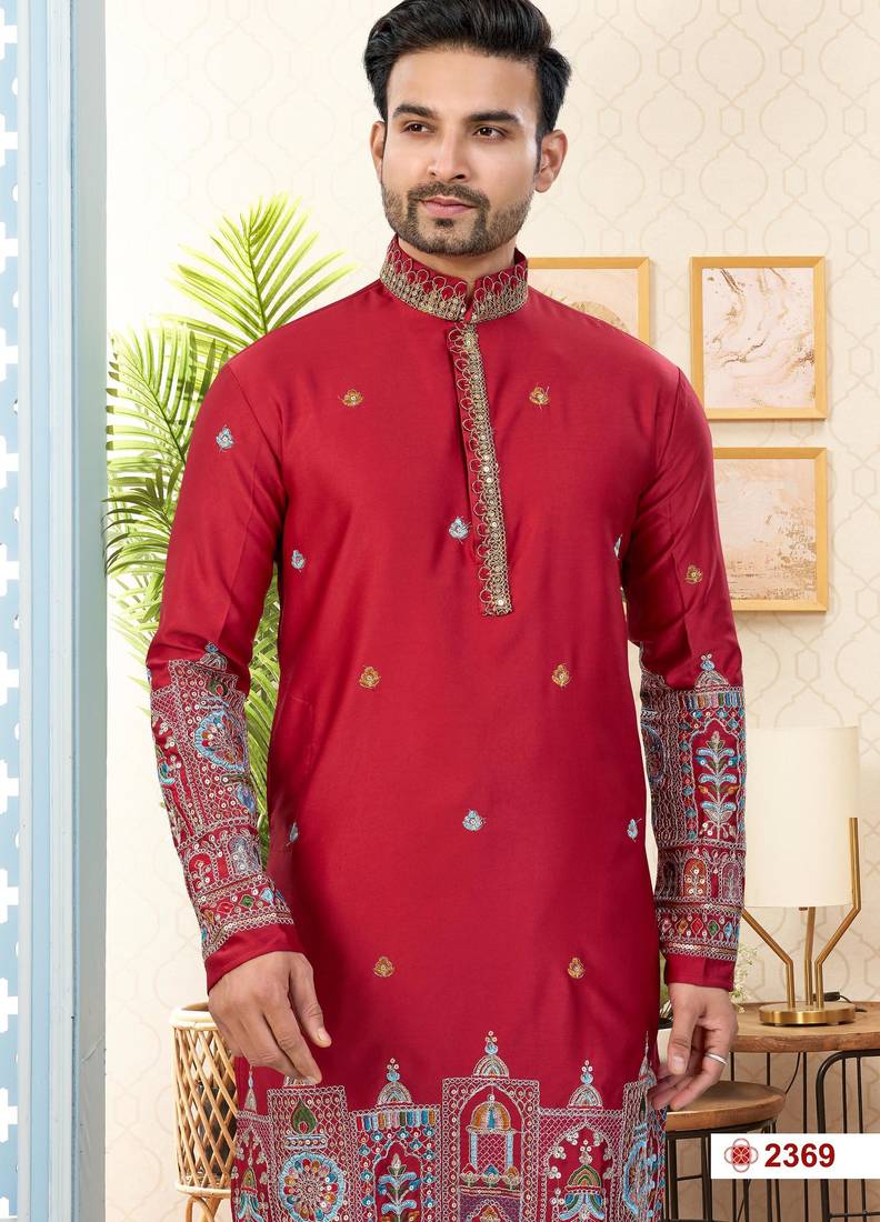 Maroon soft silk kurta pajama set with floral buti and hem embroidery—perfect for festive wear.