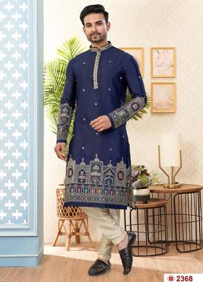 Nevy blue soft silk kurta pajama set with floral buti and hem embroidery—perfect for festive wear. 1