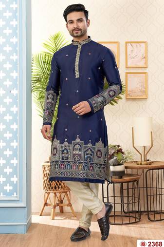 Nevy blue soft silk kurta pajama set with floral buti and hem embroidery—perfect for festive wear.