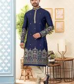 Nevy blue soft silk kurta pajama set with floral buti and hem embroidery—perfect for festive wear.