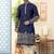 Nevy blue soft silk kurta pajama set with floral buti and hem embroidery—perfect for festive wear.