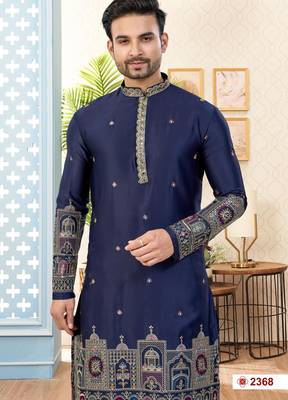 Nevy blue soft silk kurta pajama set with floral buti and hem embroidery—perfect for festive wear. 2