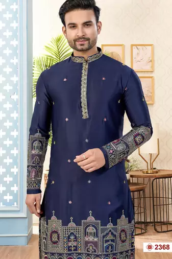 Nevy blue soft silk kurta pajama set with floral buti and hem embroidery—perfect for festive wear.