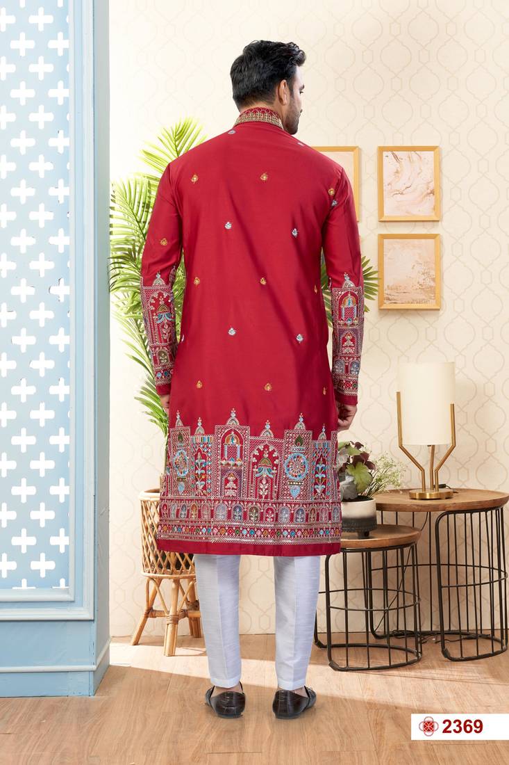 Maroon soft silk kurta pajama set with floral buti and hem embroidery—perfect for festive wear.