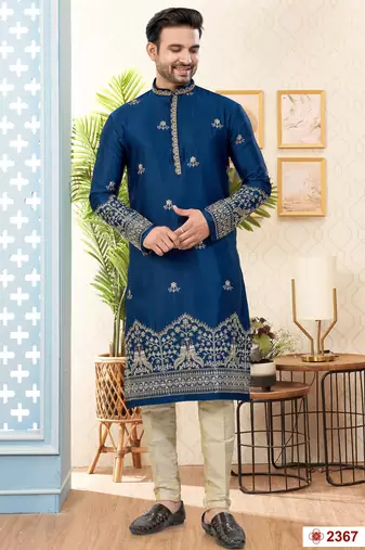 Blue soft silk kurta pajama set with floral buti and hem embroidery—perfect for festive wear.