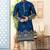 Blue soft silk kurta pajama set with floral buti and hem embroidery—perfect for festive wear.