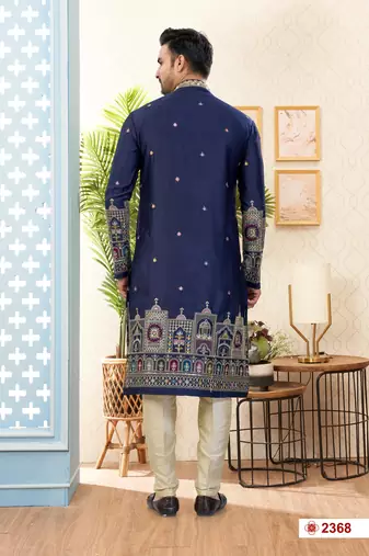 Nevy blue soft silk kurta pajama set with floral buti and hem embroidery—perfect for festive wear.