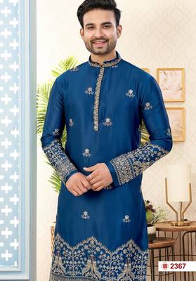 Blue soft silk kurta pajama set with floral buti and hem embroidery—perfect for festive wear. 2
