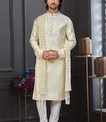 Yellow colour banarasi jacquard festive wear kurta pajama set with thread work and fancy buttons