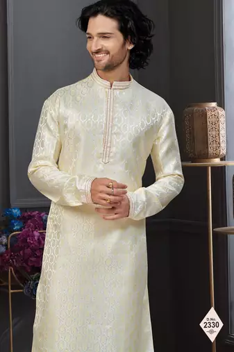 Yellow colour banarasi jacquard festive wear kurta pajama set with thread work and fancy buttons