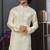 Yellow colour banarasi jacquard festive wear kurta pajama set with thread work and fancy buttons