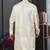 Yellow colour banarasi jacquard festive wear kurta pajama set with thread work and fancy buttons