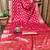 red satin bandhej printed saree with blouse
