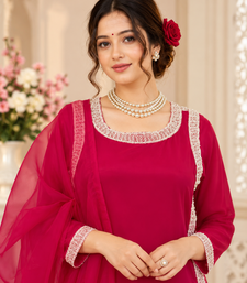 rani pink color beads and lace work crepe salwar kameez set