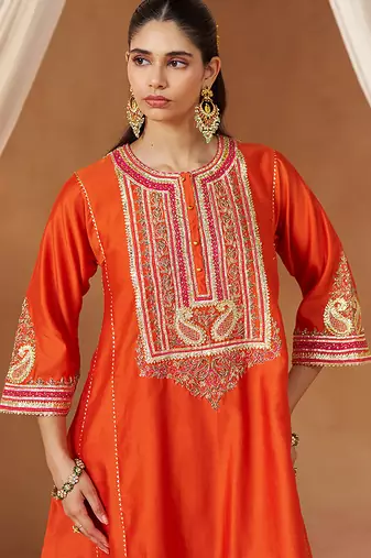 Burnt orange chauga kurta with salwar