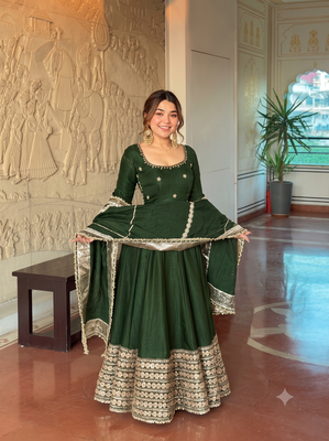 Green embroidered anarkali kurta set with pant and dupatta for women 1
