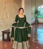Green embroidered anarkali kurta set with pant and dupatta for women