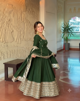 Green embroidered anarkali kurta set with pant and dupatta for women 3