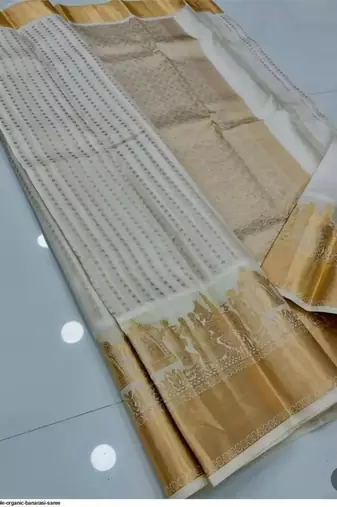 Off white silk blend jacuard work festival saree with unstitched blouse piece