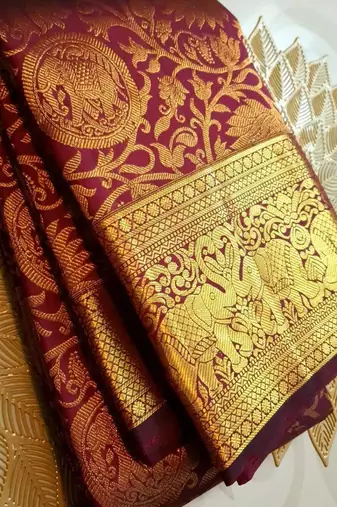 Maroon silk blend jacuard work festival saree with unstitched blouse piece
