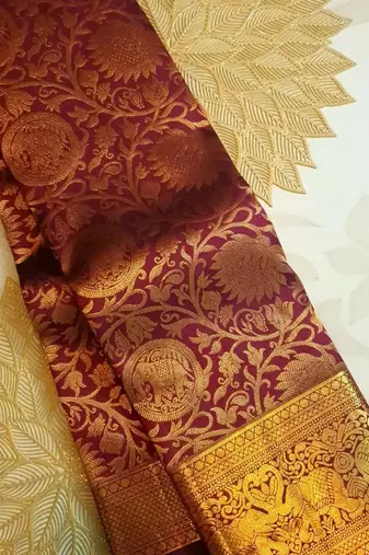 Maroon silk blend jacuard work festival saree with unstitched blouse piece