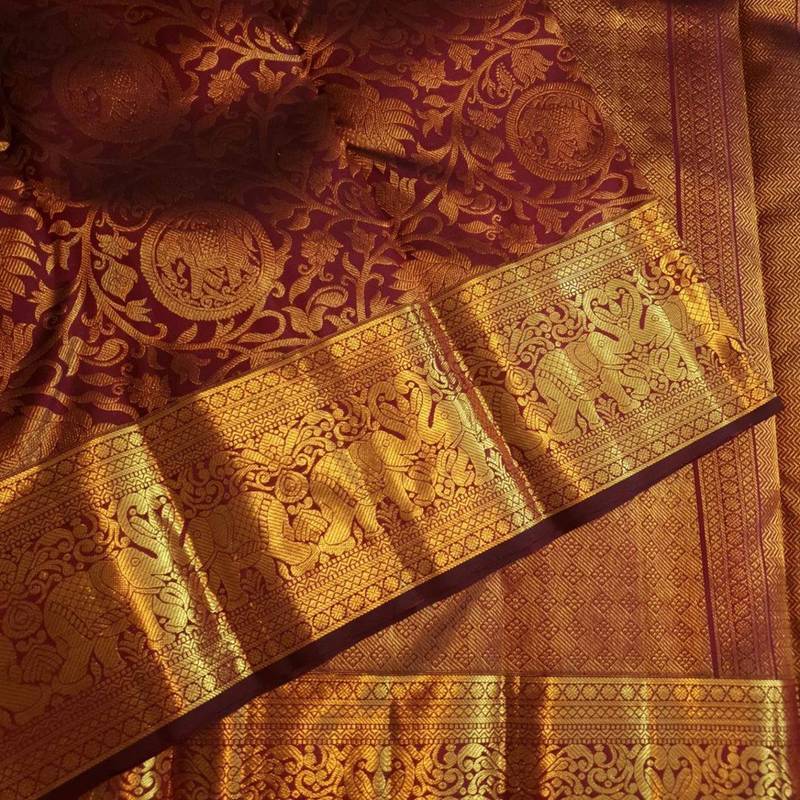 Maroon silk blend jacuard work festival saree with unstitched blouse piece