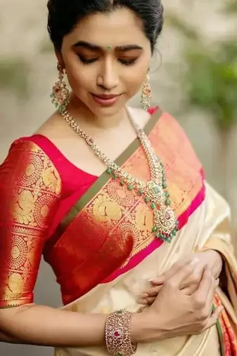 Off white red silk blend jacuard work festival saree with unstitched blouse piece